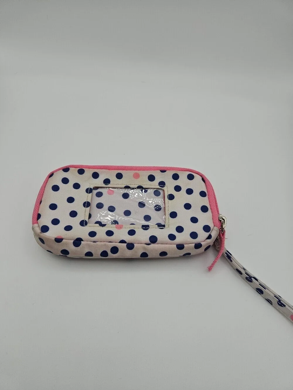 Scout white wristlet with blue polka dots and pin accents